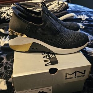 Skechers Mark Nason Black and Gold Slip-On Sneakers